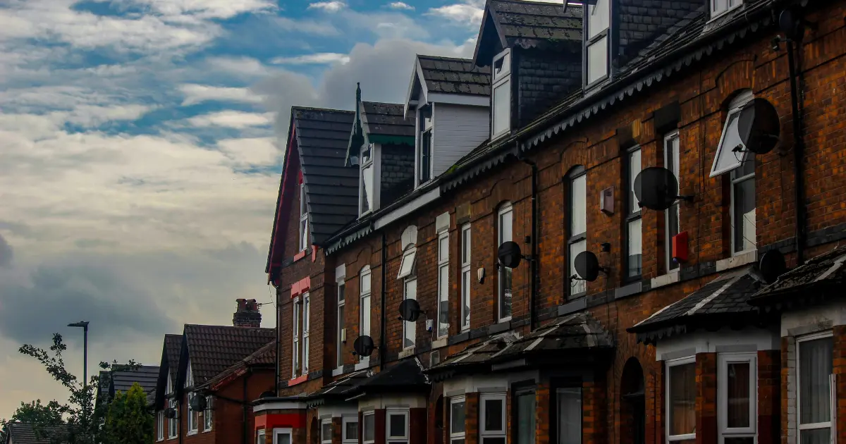 Terraced street of rental properties in England